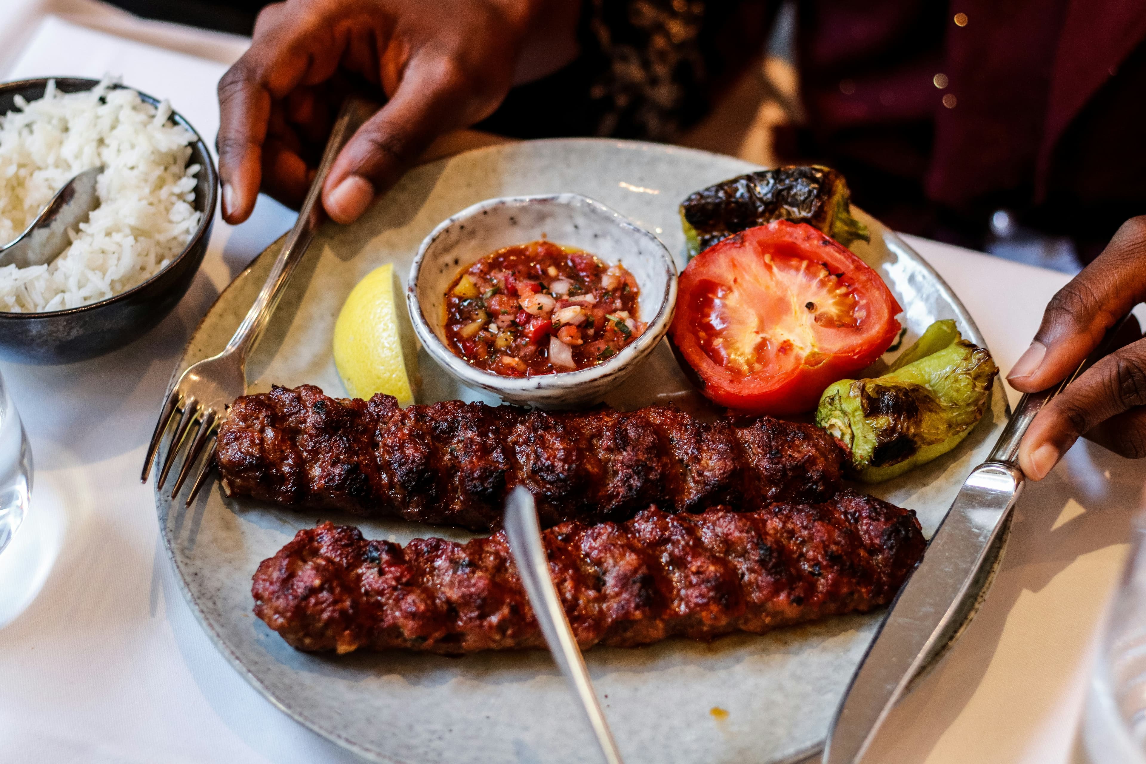 Koobideh kebabs on a platter